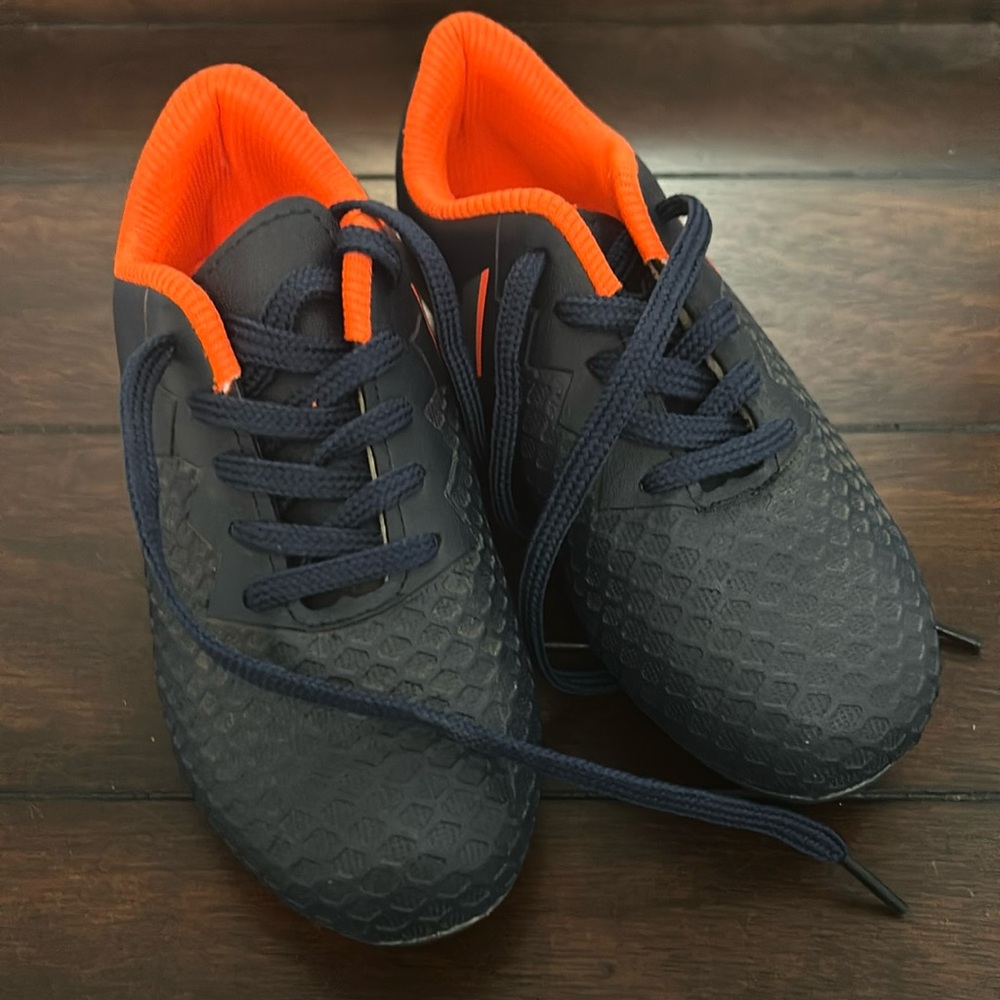 Navy and orange toddler soccer cleats, excellent condition